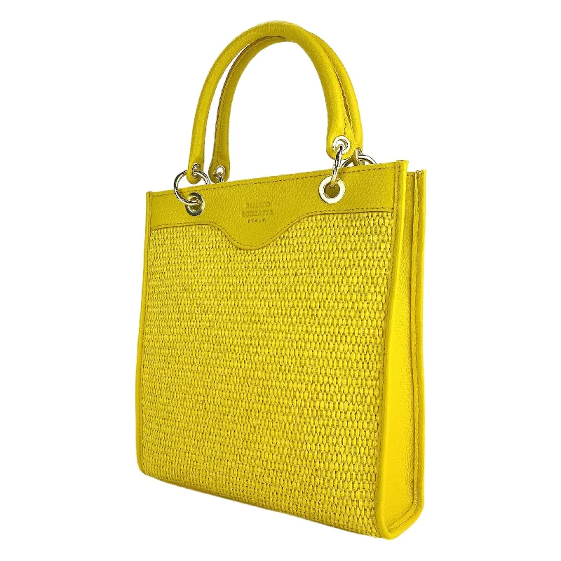RB1026R | Vertical women's handbag in genuine leather and straw Made in Italy. Removable and adjustable leather shoulder strap. Polished Gold Accessories - Yellow Color - Dimensions: 24 x 29 x 9 cm Must-Have Bags, Big Discounts RB1026R | Vertical women's handbag in genuine leather and straw Made in Italy. Removable and adjustable leather shoulder strap. Polished Gold Accessories - Yellow Color - Dimensions: 24 x 29 x 9 cm Must-Have Bags, Big Discounts